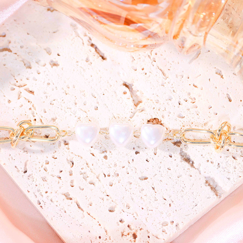 Pulseira Coracoes perola Shell e elos DCG0663