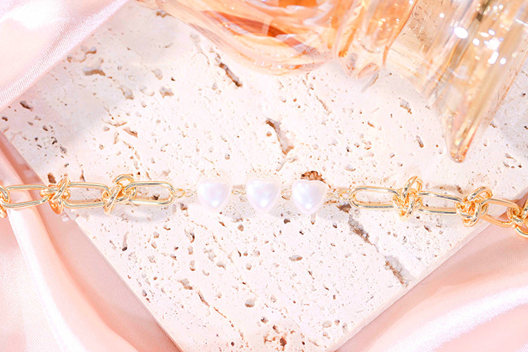 Pulseira Coracoes perola Shell e elos DCG0663