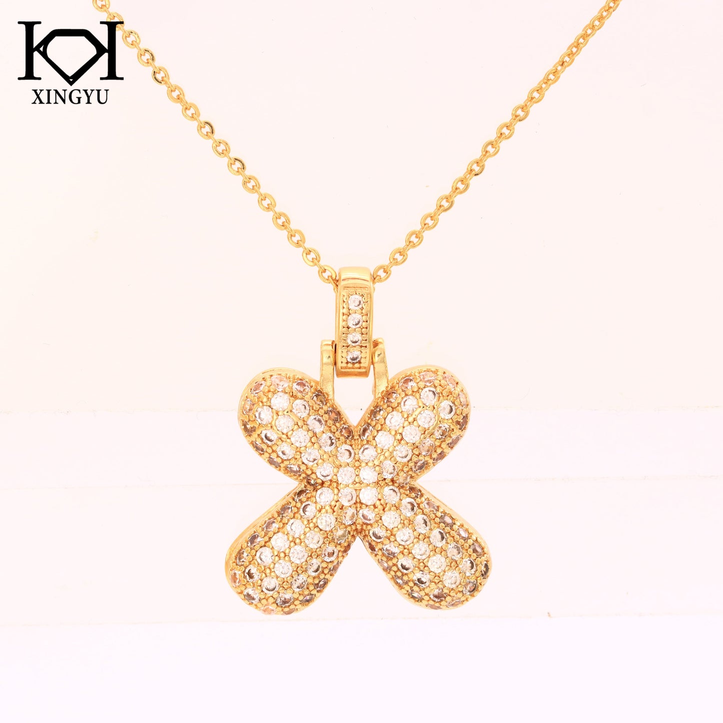 Pingente Letra inicial Cravejada XYN101526