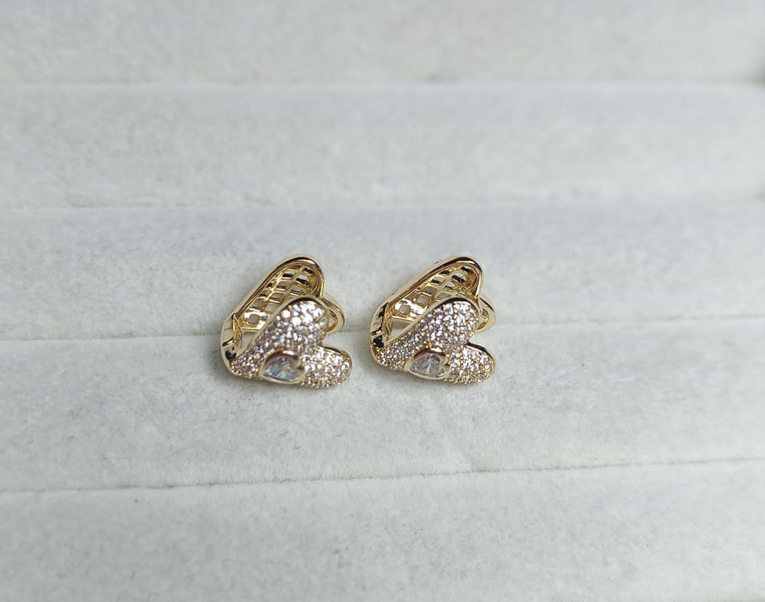 Brincos coracao unico DCG0590