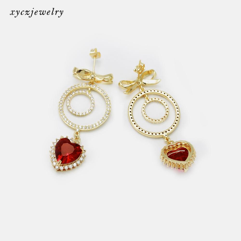 DESC-Brinco Laço e Coração XYE103853