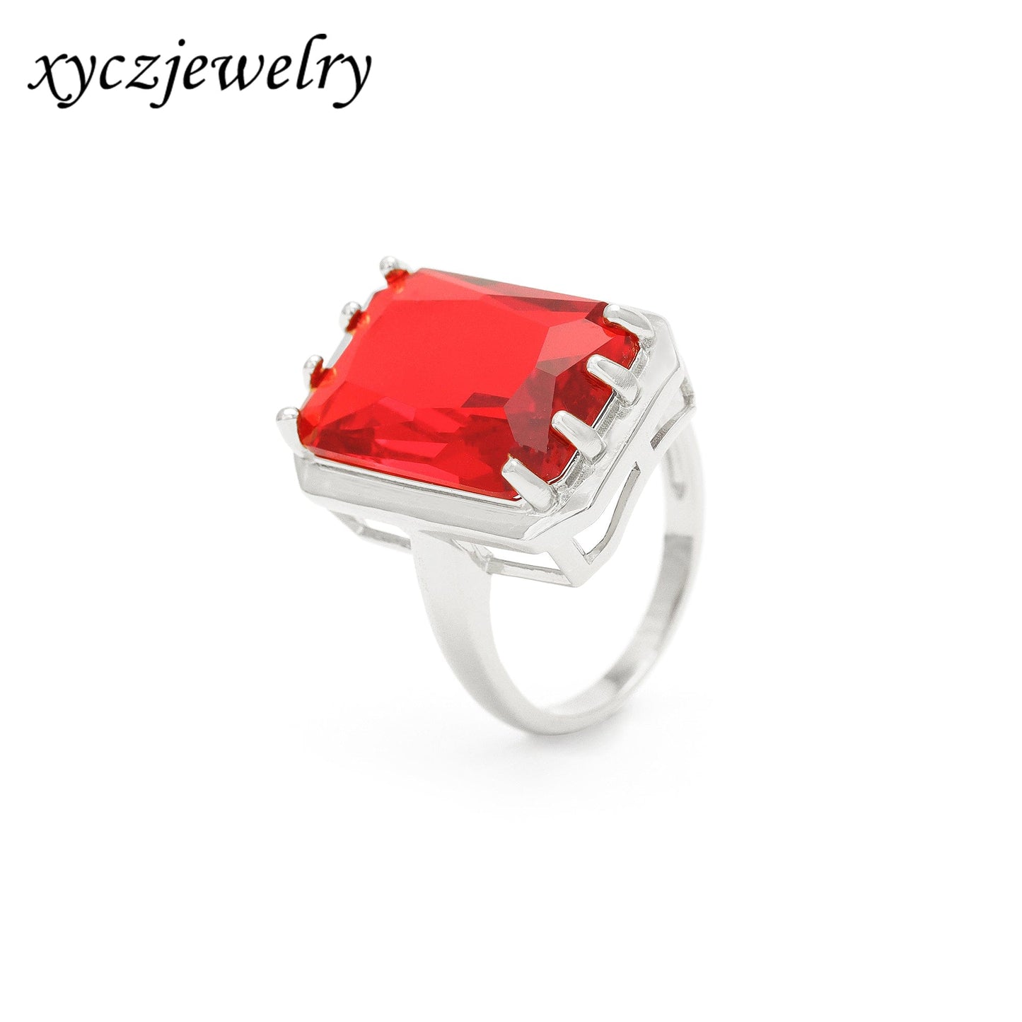 Anel solitário com pedra vermelha retangular