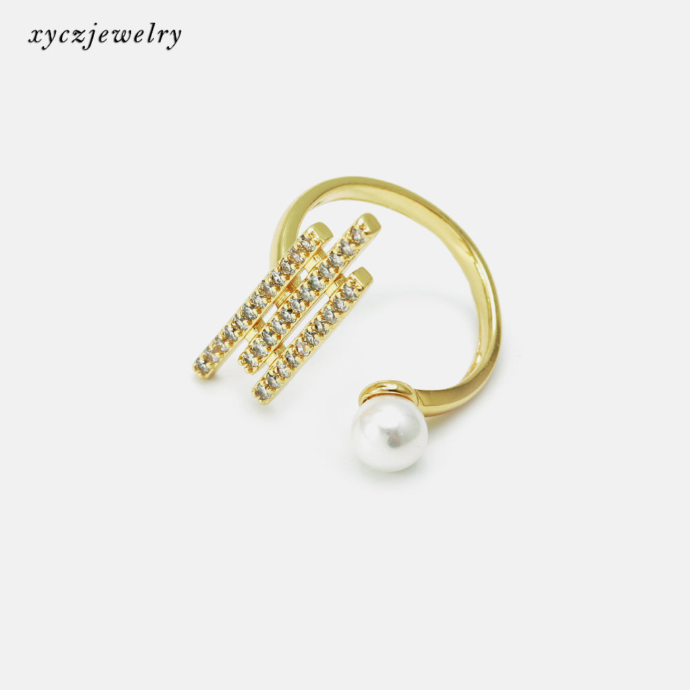 Anel satélite cravejado com pérola shell no atacado