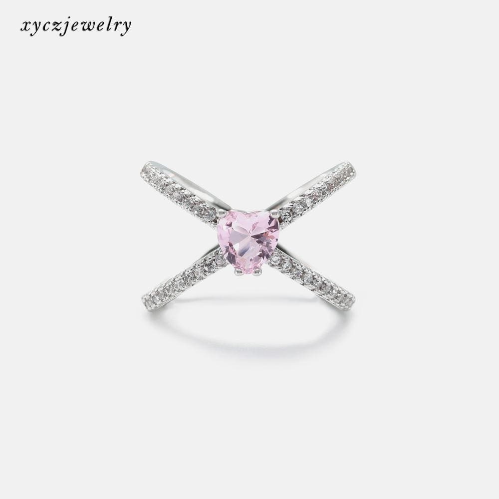 Anel cruzado com coração rosa no atacado