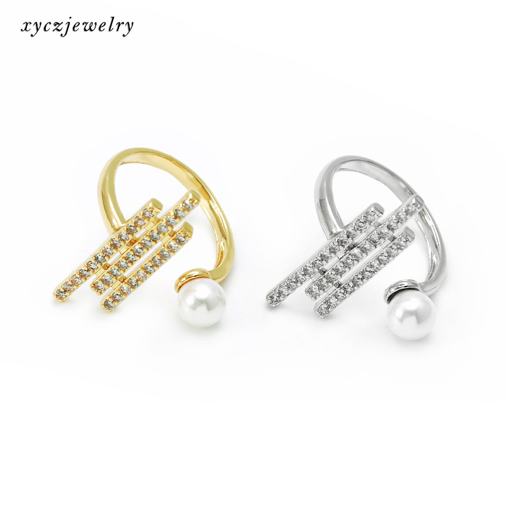 Anel satélite cravejado com pérola shell no atacado