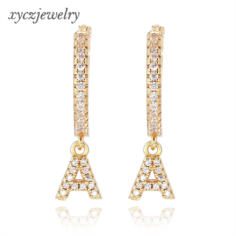 Brinco Argolinha Inicial XYE102714