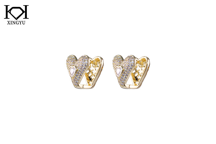 Brincos coracao unico DCG0590