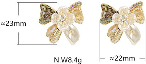 Brinco laço cintilante em madre perola - CCG1001