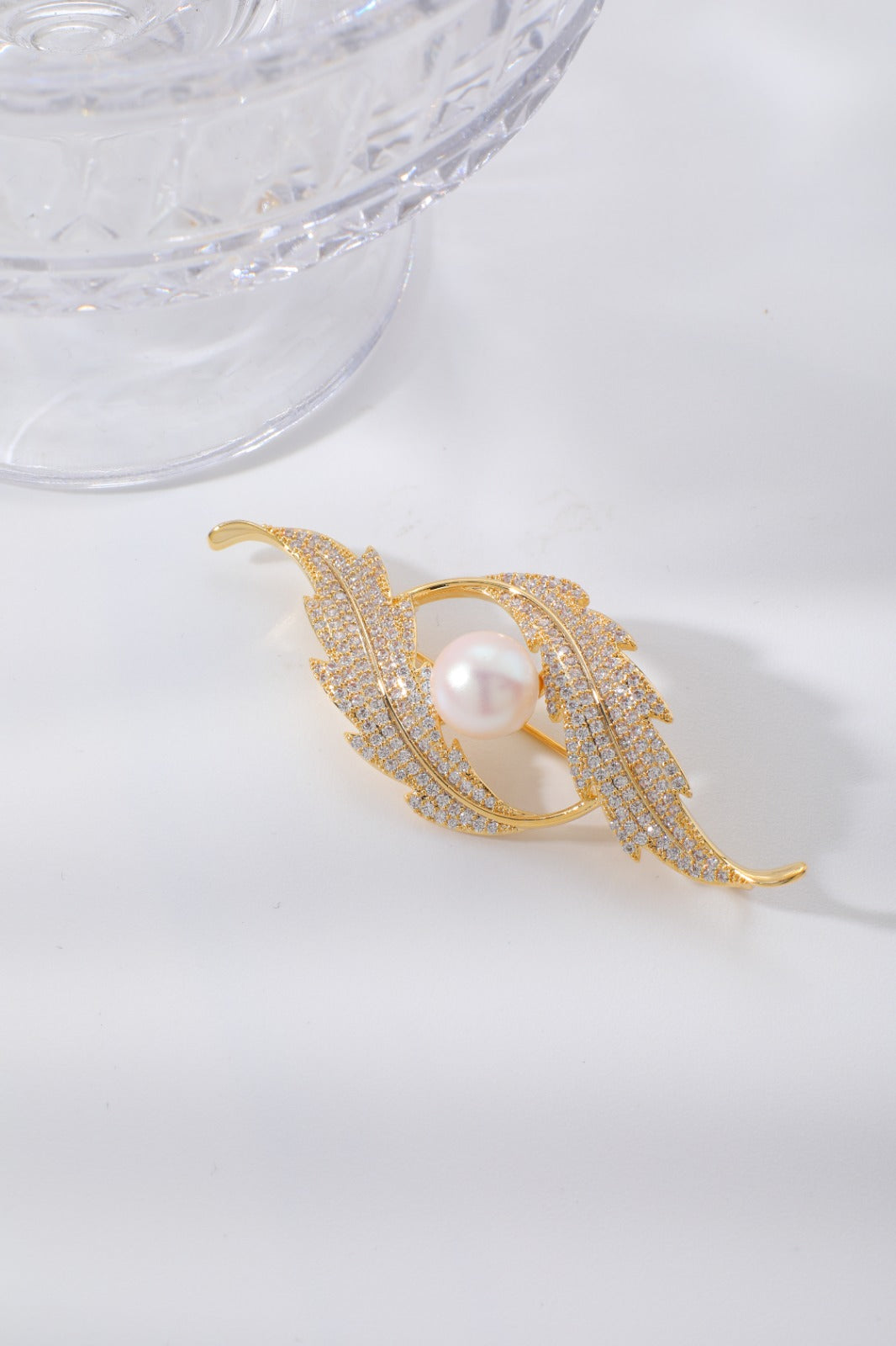 Broche movimento e luxo EBG0001