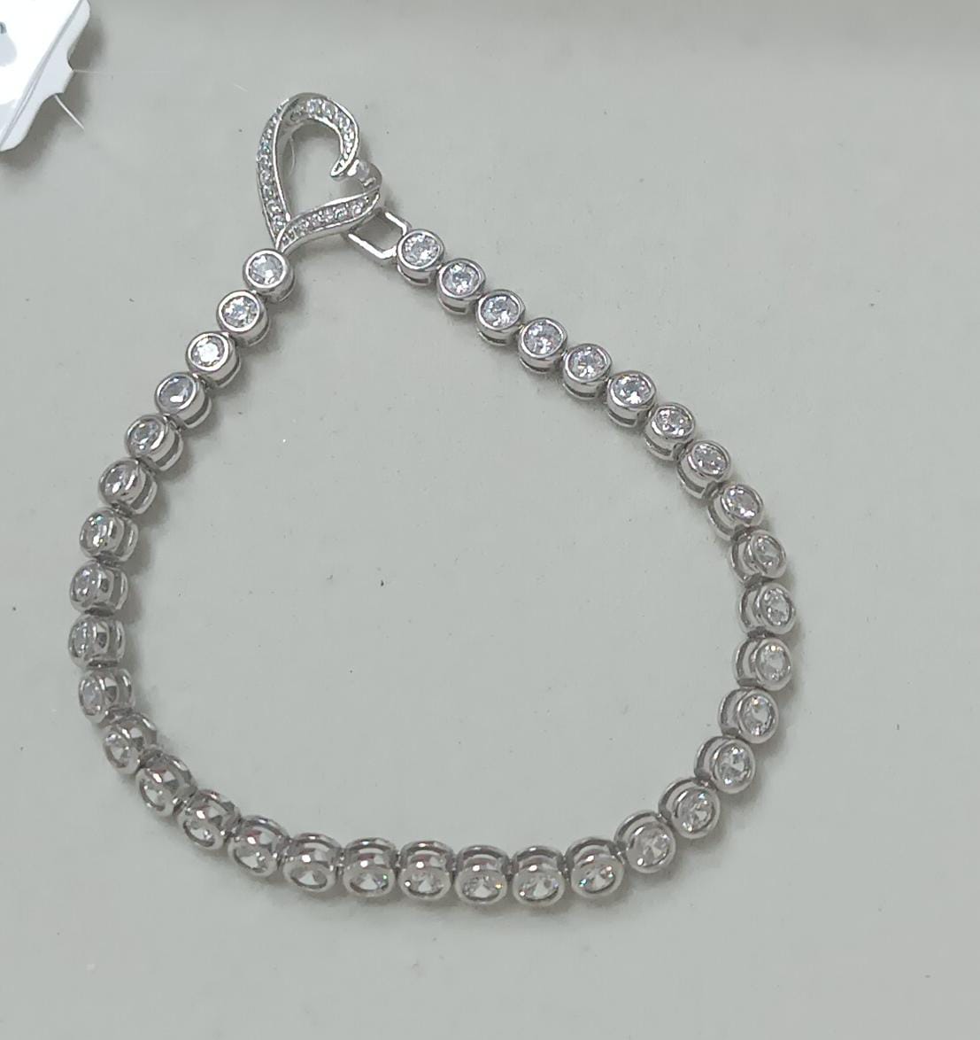 Bracelete  Prata 925 e diamante de Alto Carbono Cravacao Inglesa Coracao  ZTS00104