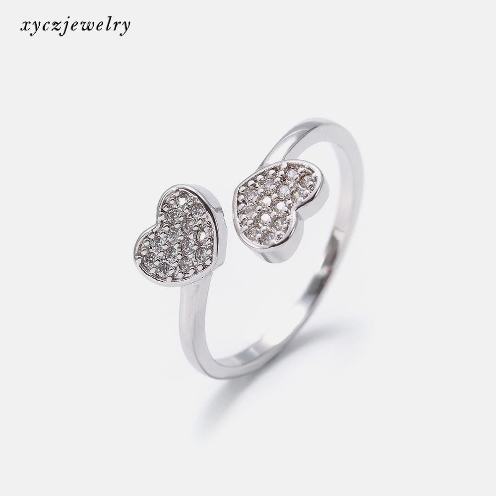 Anel aberto com pontas de coração no atacado 